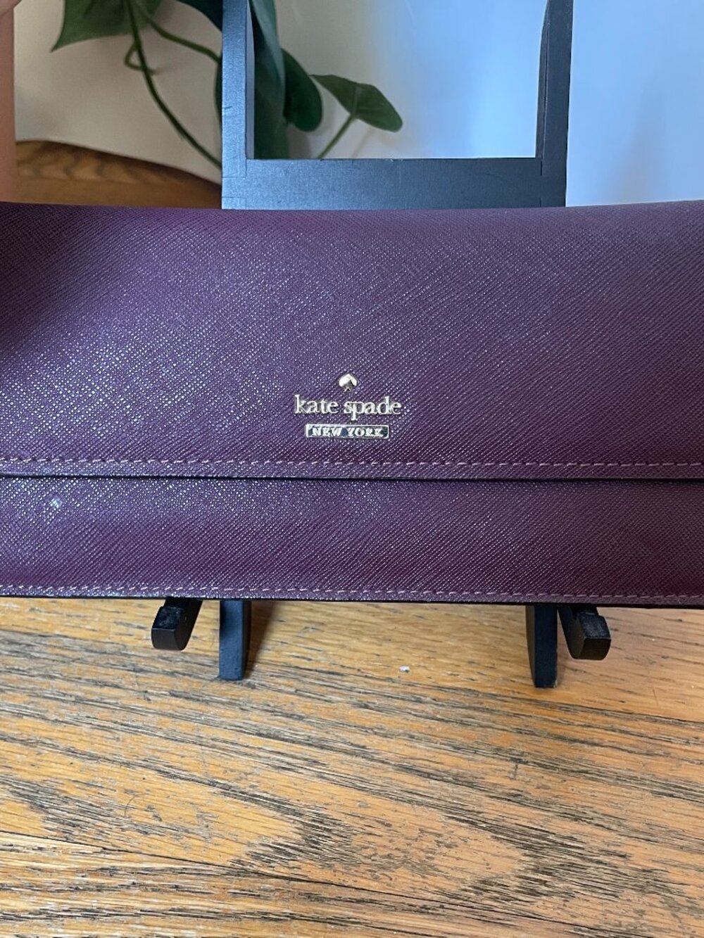 Kate Spade Large bi- Fold wallet in Deep Plum